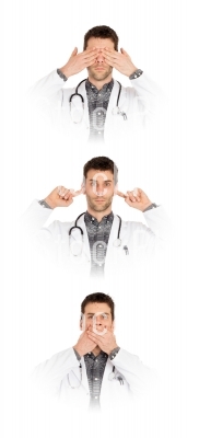 Doctor isolated on white - Sees, hears and speaks no evil 