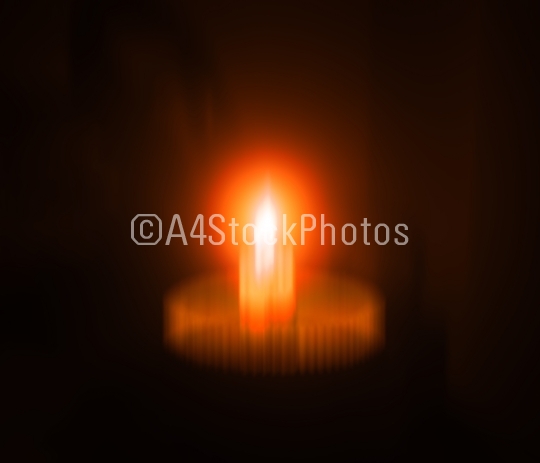 Fire candle in bowl dark composition