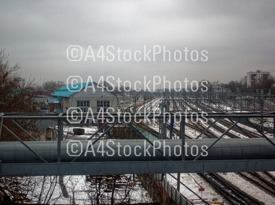 the railway junction in the gray winter day 