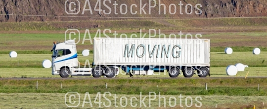 Truck driving through a rural area - Moving