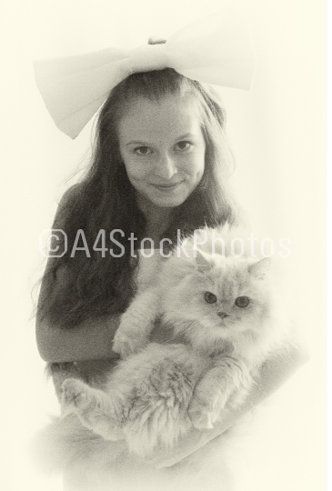 Usual,beautiful portrait of fantastic cute,pretty,nice,perfect,beautiful girl,little girl with long hair and big fluffy Persian cat stand in photo-studio on white background.Black-and-white photo.Cool