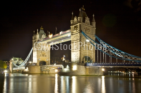 Tower Bridge at night, looking downstream