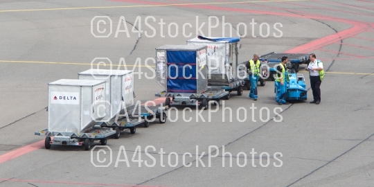 AMSTERDAM - JUNE 29, 2017: Planes are being loaded at Schiphol A