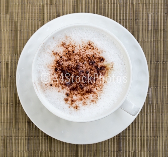 Cappuccino in a cup of cocoa