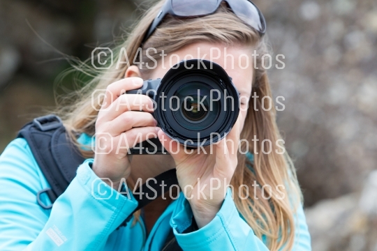 Close up of a female photographer