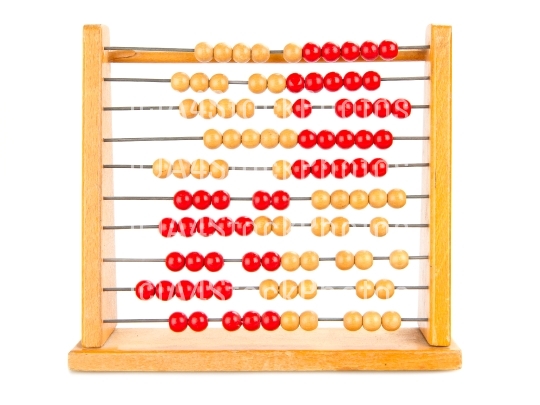 Close-up of an old abacus on a white background