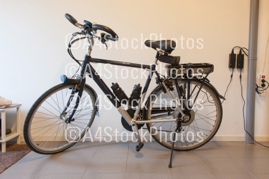 Electric bicycle in a garage