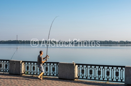 Fishermans on the Dnipro embankment in Ukraine