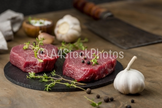high angle meat with herbs garlic