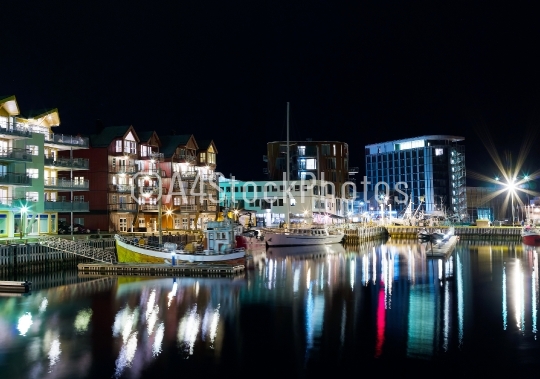 Horizontal night lights of Norway town background