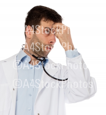 Humorous portrait of a young depressed surgeon with a stethoscop