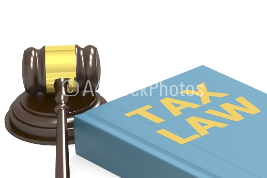 Judge gavel with tax law on blue book