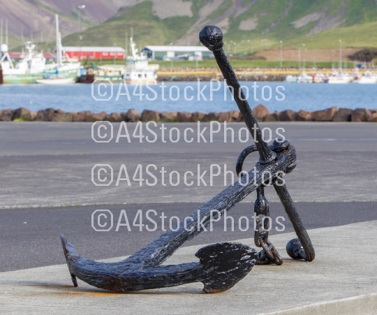 Old anchor on the sea coast