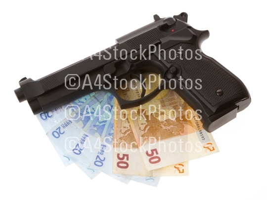 Semi-automatic gun and money isolated