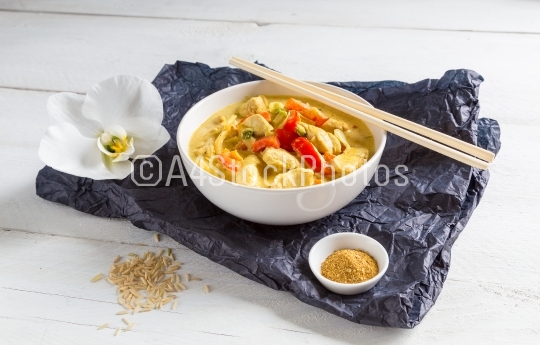 Thai Curry in a bowl on wood