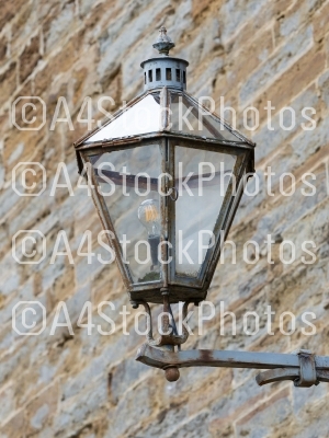Vintage looking metal lantern with modern lamp 